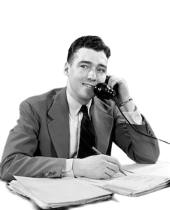 Man on the phone, 1950s_ Black and white photo_